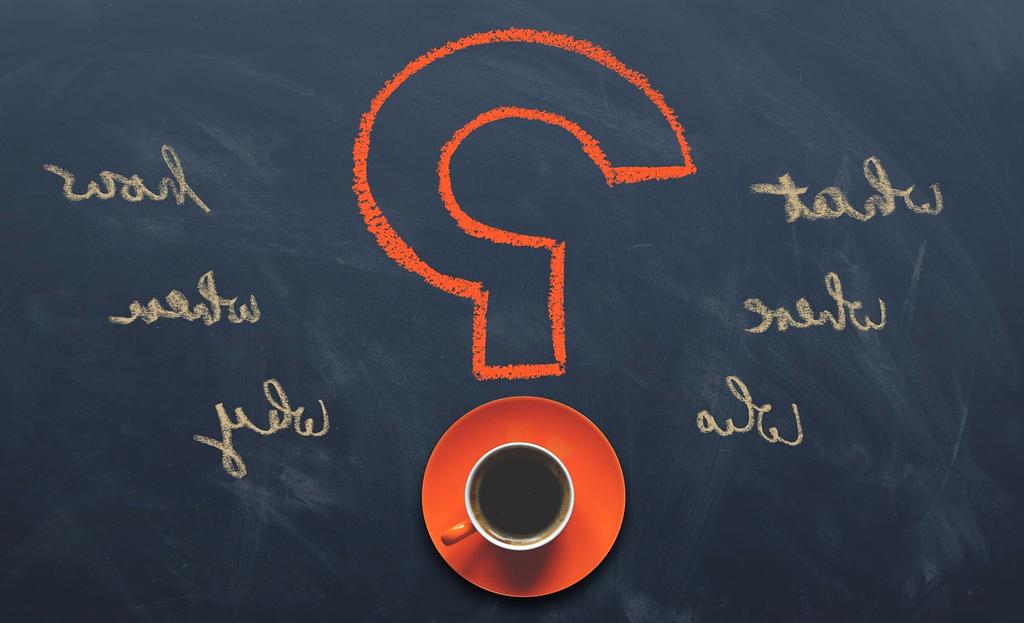 Close-up of emergency fund jar with coins